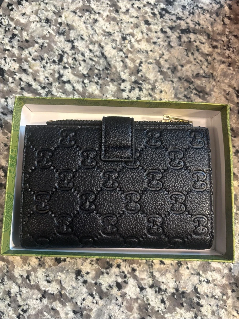 Black Embossed Microguccissima Leather Bifold Wallet with Gold Snap